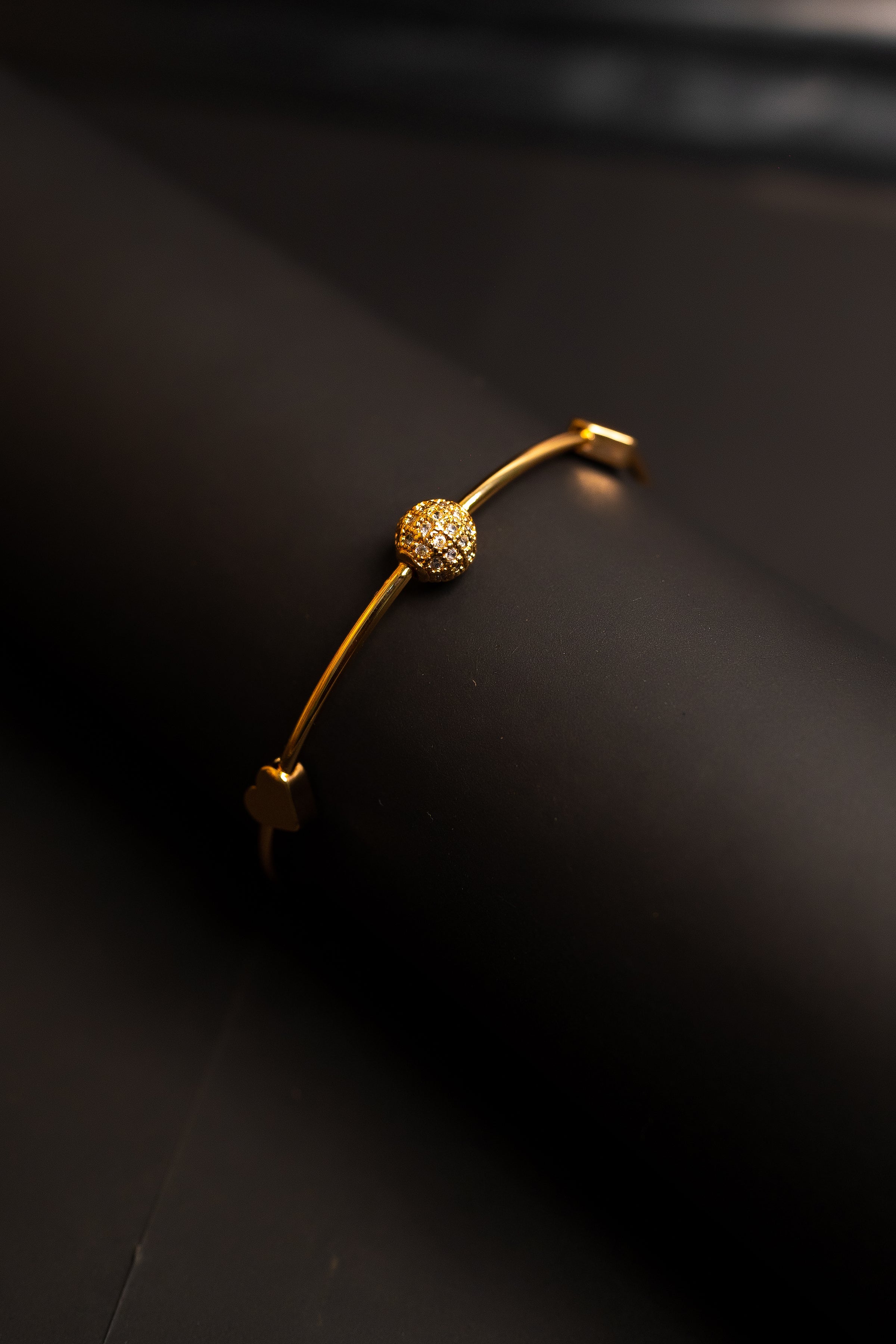 shiny, gold-colored metal with a smooth finish