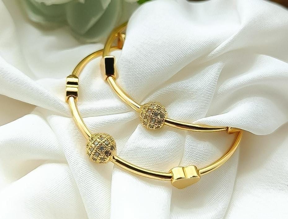 shiny, gold-colored metal with a smooth finish